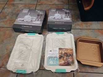 11in saute pan and lid ..3 qt pot and lid ...2.. 13by19 cookie sheets  and a brownie pan all for 35 doll