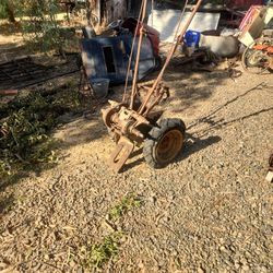 Yard Art Walk Behind Tractor Bohlens