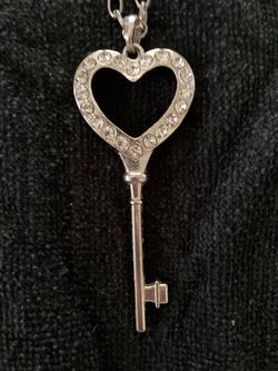 Silver heart shaped key necklace