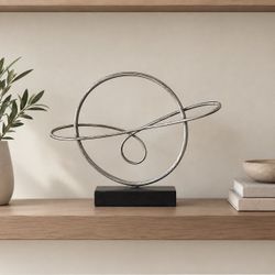 Abstract Metal Loop Sculpture on Black Base