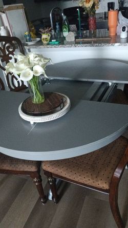 Grey table with 4 chairs brown