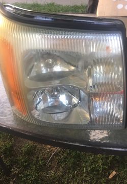 2002 escalate HEADLIGHTS