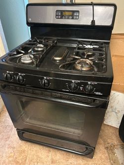 Gas stove and under the hood microwave oven