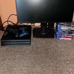 Monitor and PS4 pro with 2 controller and a bunch of controllers