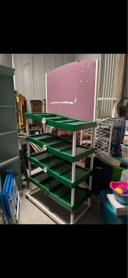 Green Multi-Tier Display Rack with Sign Board