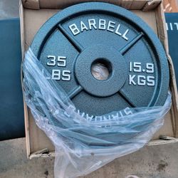 Clearance!! Olympic 35lb Cast Plates $1lb NEW