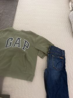 Sweater and Jeans .