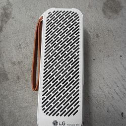 le:
Portable LG PuriCare Mini Air Purifier - Perfect for Car, Desk, or Travel! 