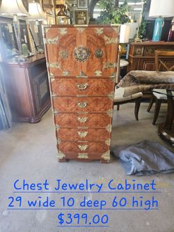 Chest or Jewelry Cabinet We are located at 2811 East Bell road. Another Time Around Furniture.