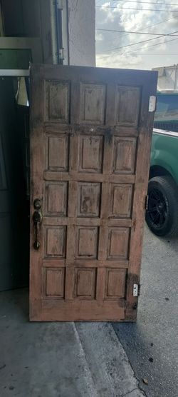 Exterior solid wood door front paint is peeling 36x79 everything else is in great condition