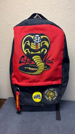 Cobra Kai Big Logo Strike First Zipper Puller Backpack By Bioworld