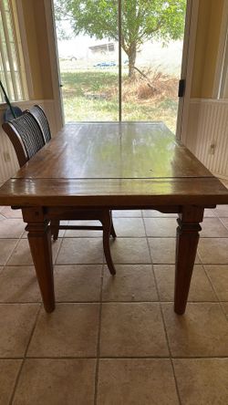 Wood table with two matching chairs