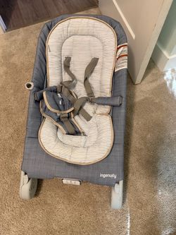 Vibrating baby bouncer