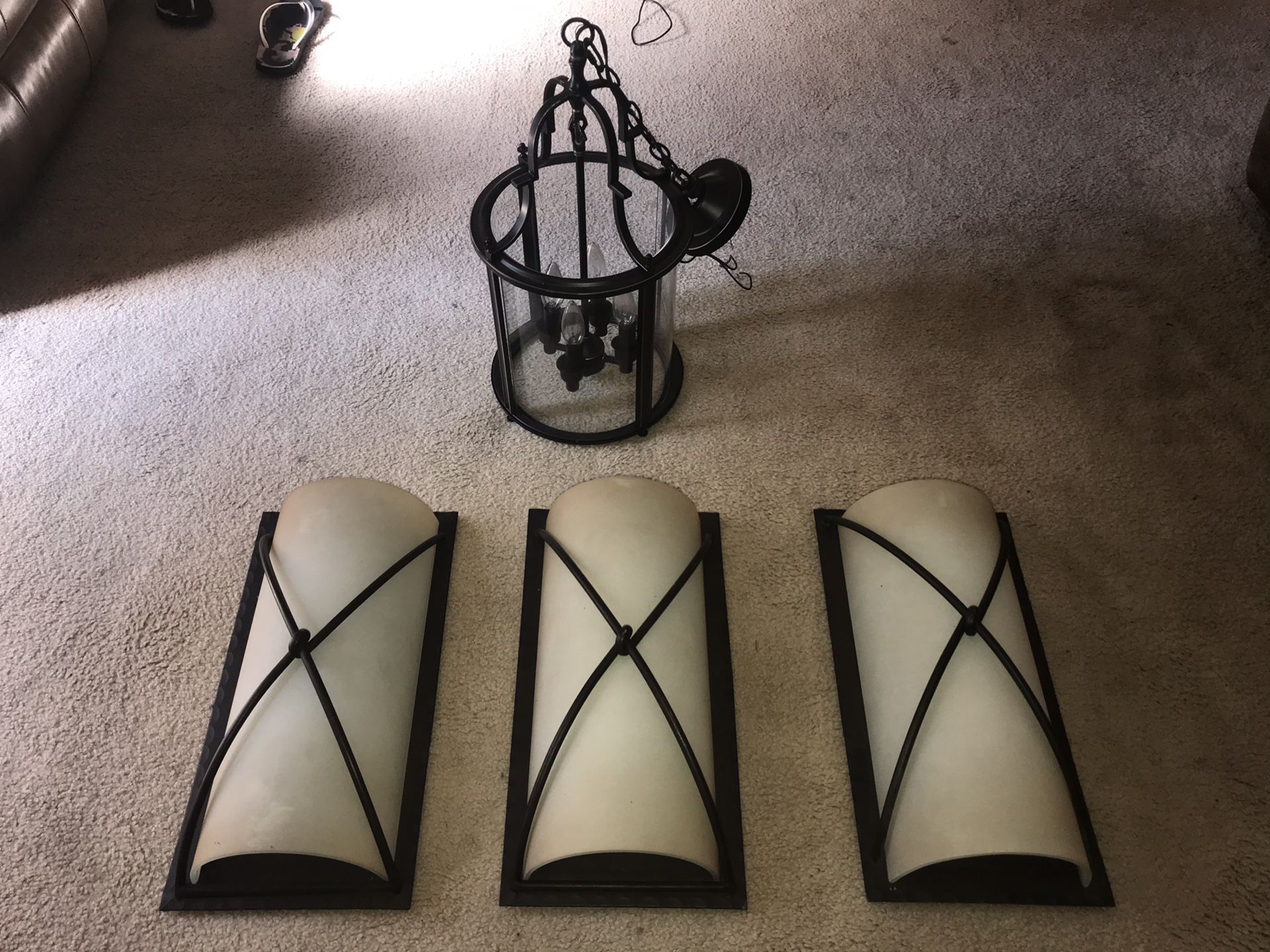 1 beautiful chandelier with 3 matching wall sconces. Worth over $1600... see pics of prices listed on amazon...