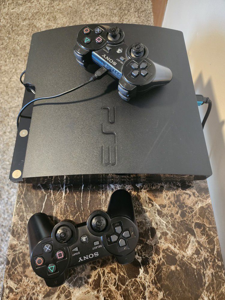 Orginal PS3 With Two Controllers 