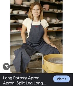 Durable gray split-leg apron is made of a water-resistant