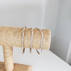 Set of three silver bangles/bracelets
