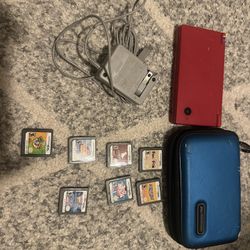 Nintendo DS Red Bundle With Holder 7 Games And A Charger, Works Good