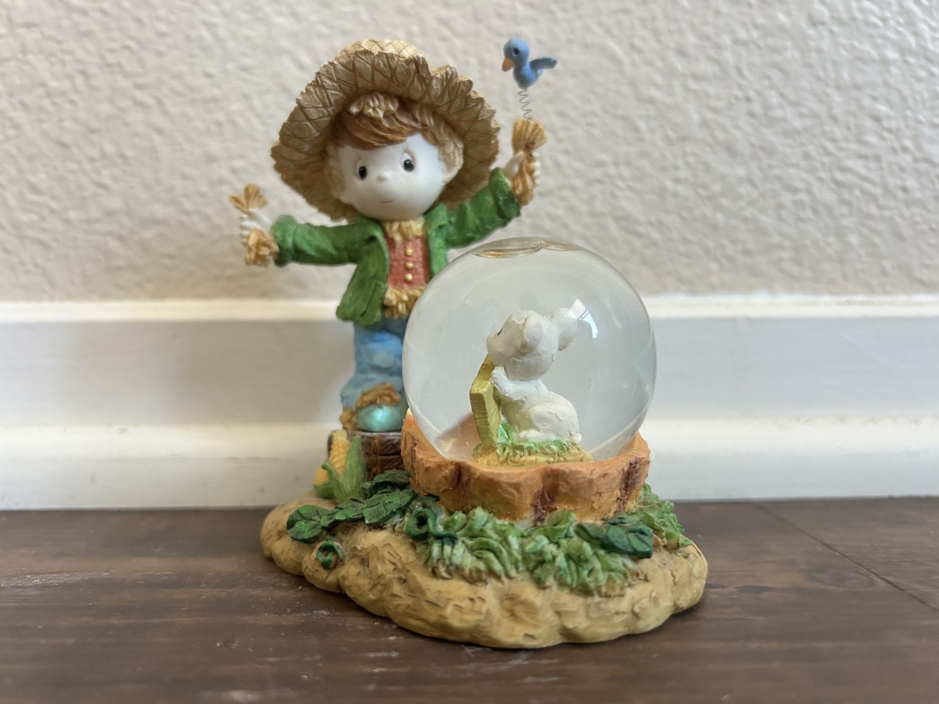 Precious Moments Figurine with Snow Globe