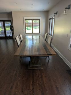 Custom hickory dining table with four chairs.