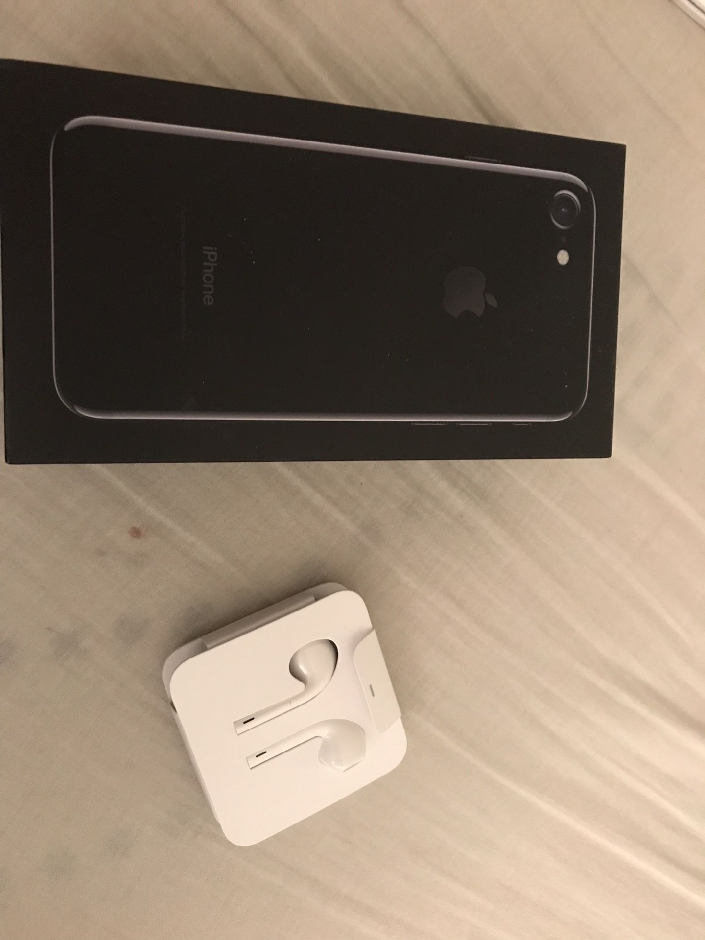 iPhone 7. Black. 32g. Excellent condition. Includes new earbuds. Black otter box case