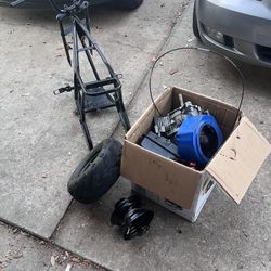 Frame Tired And Box Of Mini Bike Parts
