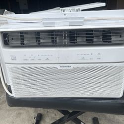 Used Toshiba Air Conditioner AC 8000 Btu/hr. With Remote And Window Bracket