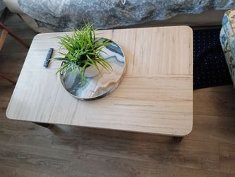 Beautiful Stone-like coffee table . See pictures for Measurements. Real wood and heavy. No damages