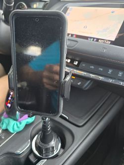 Universal phone cup holder .