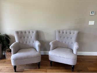 Two soft gray chairs