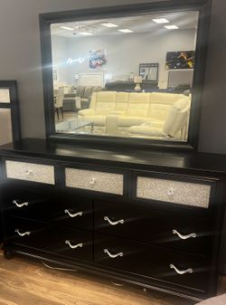 Black dresser with mirror