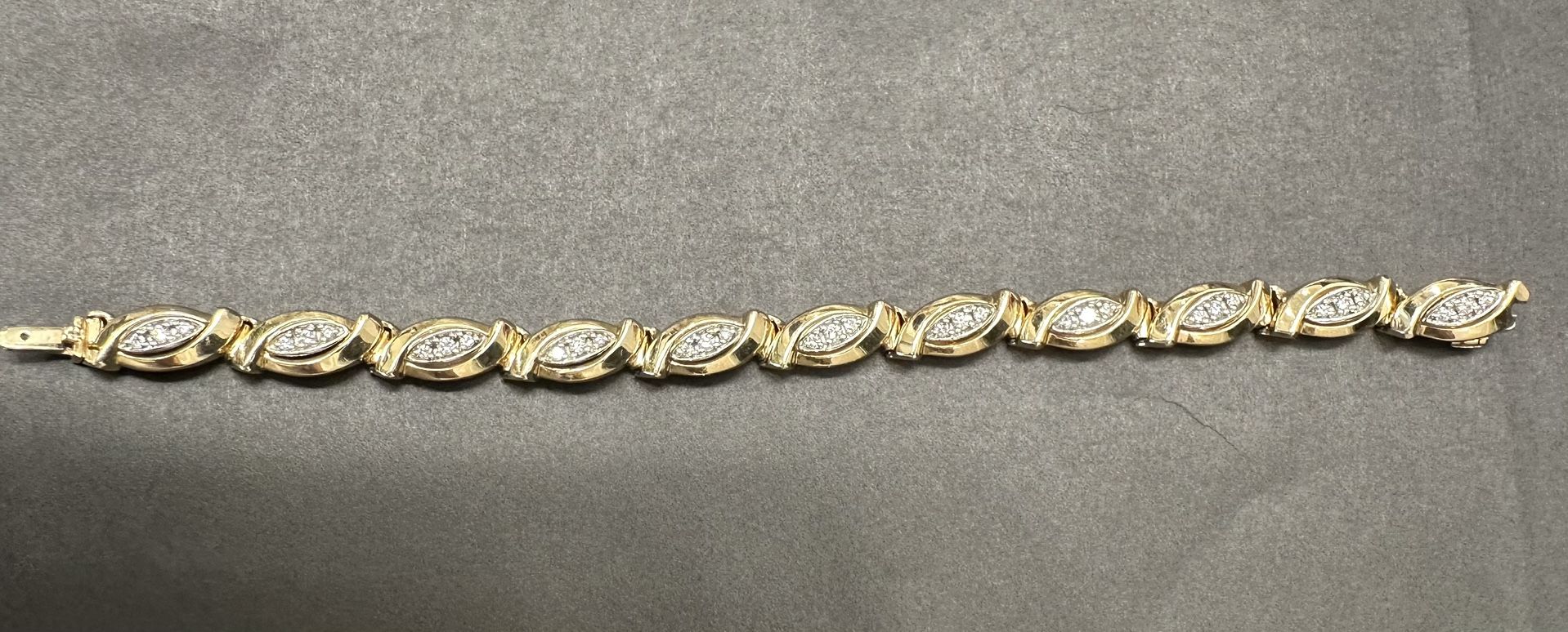 Diamond And 14 Karat Gold Tennis Bracelet