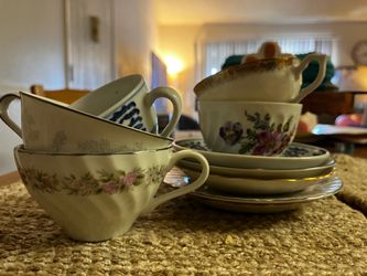 Assorted tea cups and saucers