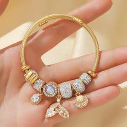 Gold.colored Mermaid Style Charm Bracelet
