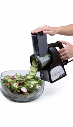Electric cheese and vegetable chopper used Electric cheese and vegetable chopper used once