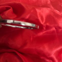 MK Silvertone Bangle bracelet $10