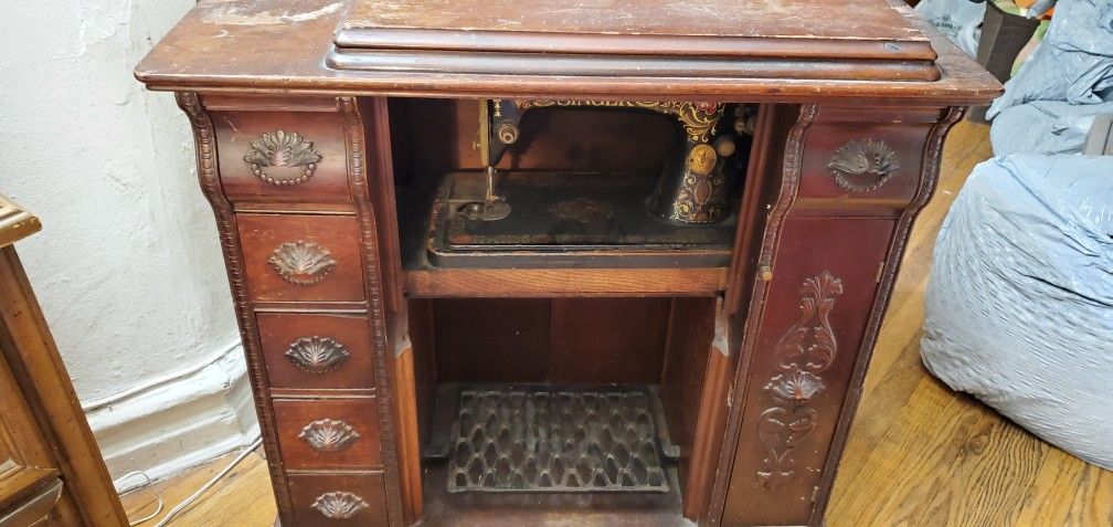 vintage singer mechanical machine.