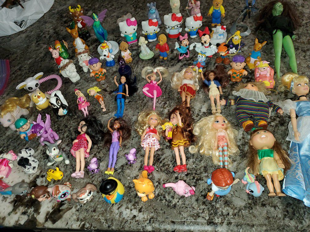 Lot of 70 dolls and girls toys all for $25