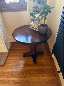 Round Dark Wood Pedestal Accent Table
