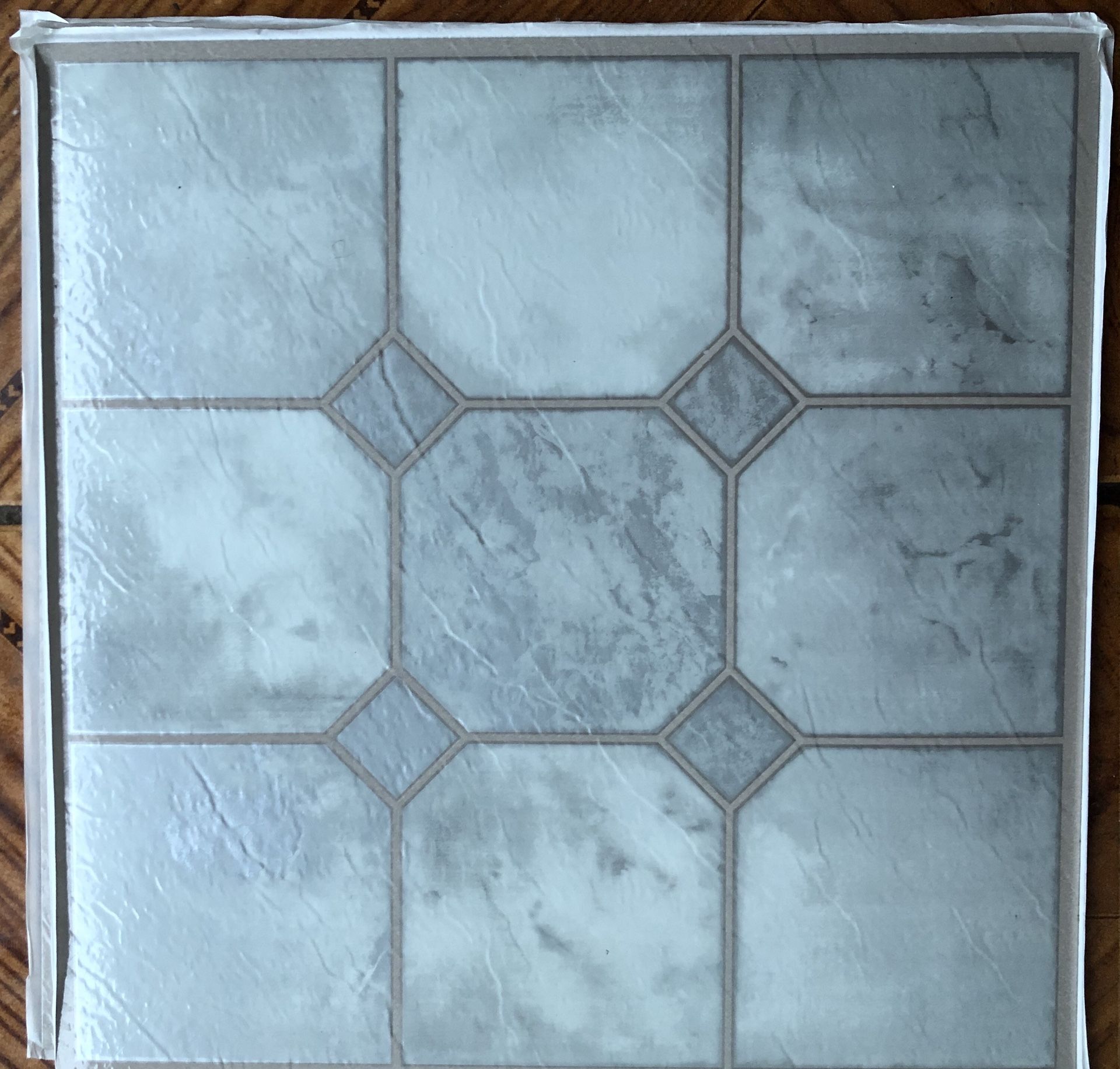 Beautiful silver grey colored Self stick tiles vinyl flooring