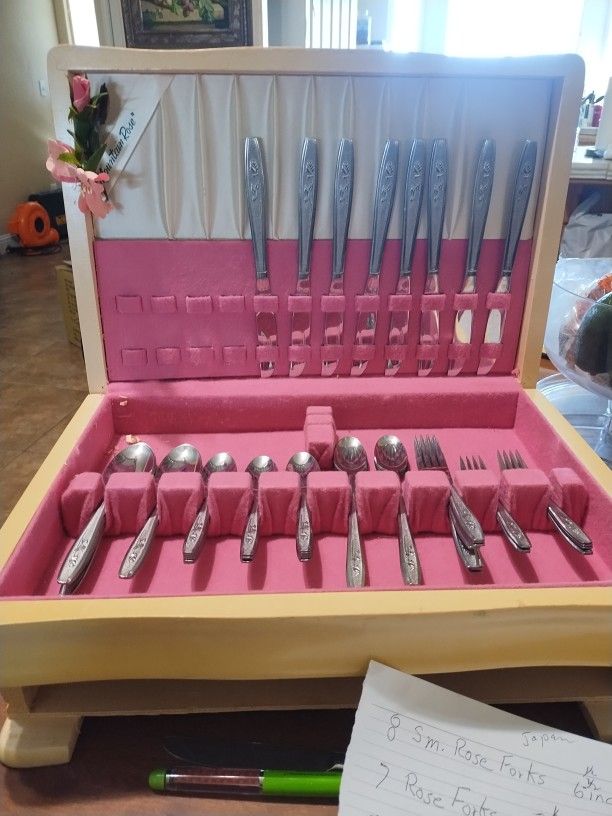 Mountain Rose Silverware  55 Pieces of Silverware Including Box  .  Box Slight damage