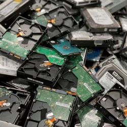 Harddrives are pulled from laptop and desktop.