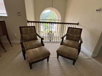 Pair of upholstery armchairs with matching ottomans