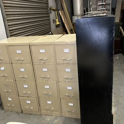 Four drawer file cabinets and large black legal file cabinet