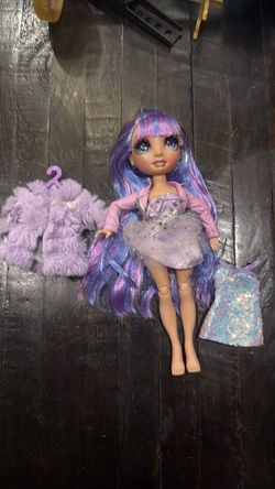 an MGA Rainbow High Series 1 Violet Willow doll