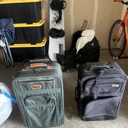 Two Carry On Suitcases