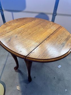 Round side table with folded sides