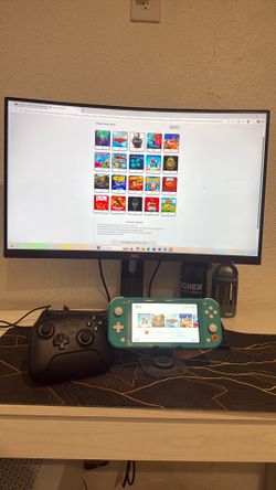 Nintendo Switch Lite 1TB MicroSD with controller and games
