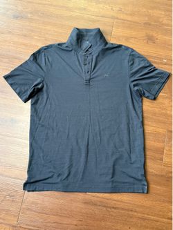 TravisMathew Black Golf Polo Quiet Luxury Performance Athleisure L