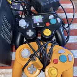 GameCube With Controllers And A Game 